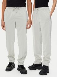 Rains Spodnie przeciwdeszczowe Unisex 18560 Beżowy Regular Fit. Brązowe spodnie sportowe damskie Rains, s, z syntetyku, żeglarskie. Za 169.99 zł.