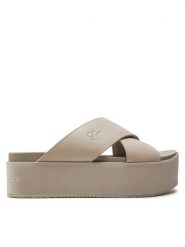 Calvin Klein Jeans Klapki Flatform Cross Mg Uc YW0YW01349 Beżowy. Brązowe klapki damskie Calvin Klein Jeans, bez wzorów, z jeansu, bez obcasa. Za 259.99 zł.
