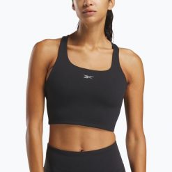 Koszulka Reebok Lux Tank. Czarne t-shirty damskie REEBOK FITNESS, bez wzorów, bez kołnierzyka. Za 179.99 zł.