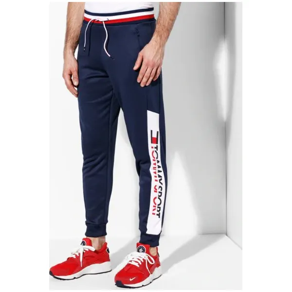 Tommy Sport Spodnie Jogger 251 , granatowy, rozmiar M. Niebieskie spodnie materiałowe męskie Tommy Hilfiger, z bawełny. W wyprzedaży za 319.99 zł.