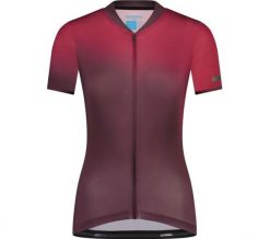 Damska koszulka z krótkim rękawem EVOLVE Avventura, matowy róż. Czerwone bluzki sportowe damskie SHIMANO, m, z elastanu, bez kołnierzyka, bez ramiączek. Za 488.90 zł.
