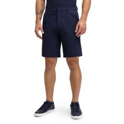 Męskie krótkie spodenki golfowe Siroko Belfry Navy. Niebieskie szorty męskie SIROKO, z materiału, bez kołnierzyka. Za 257.00 zł.