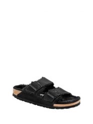 Birkenstock Skórzane klapki "Arizona" w kolorze czarnym rozmiar: 36. Czarne klapki damskie Birkenstock, bez wzorów, ze skóry, bez obcasa. Za 311.85 zł.