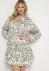 Zielona Wiskozowa Sukienka w Etniczny Wzór o Rozkloszowanym Kroju z Wiązaniem Nalpio. Zielone sukienki damskie Born2be, na co dzień, l, bez wzorów, z materiału, eleganckie, bez kołnierzyka, bez ramiączek, mini, rozkloszowane. W wyprzedaży za 103.99 zł.