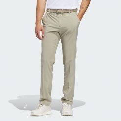 Spodnie Ultimate365 Tapered Golf. Brązowe spodnie materiałowe męskie Adidas, bez wzorów, z materiału, sportowe. Za 349.00 zł.