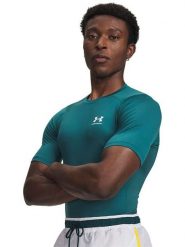 Under Armour Koszulka sportowa "Armour Comp" w kolorze morskim rozmiar: S. Zielone t-shirty sportowe męskie Under Armour, s, z materiału, bez ramiączek, outdoorowe. Za 104.95 zł.