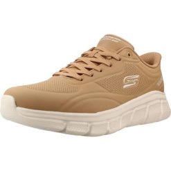 Buty SKECHERS BOBS B FLEX - SMOOTH EDGE Jasnobrązowy. Brązowe buty fitness męskie Skechers, z syntetyku, bez zapięcia, na fitness i siłownię. Za 319.99 zł.