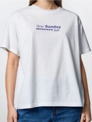Bawełniana koszulka z nadrukiem na plecach - kremowy. Białe t-shirty damskie Sinsay, l, bez wzorów, z bawełny, bez kołnierzyka. Za 29.99 zł.