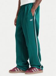 Adidas Spodnie dresowe Adicolor Spacer Baggy Track Pant KS7429 Zielony Relaxed Fit. Zielone spodnie dresowe męskie Adidas, bez wzorów, z bawełny. Za 349.99 zł.