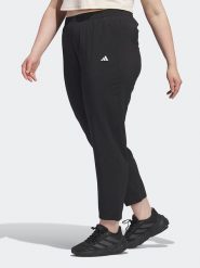 Adidas Spodnie sportowe w kolorze czarnym rozmiar: 4X. Czarne spodnie dresowe damskie Adidas, z materiału, outdoorowe. Za 118.56 zł.