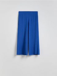Spodnie culotte - granatowy. Niebieskie spodnie materiałowe damskie Reserved, bez wzorów, z dzianiny. Za 69.99 zł.