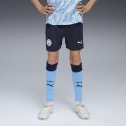 Młodzieżowe szorty Manchester City 25/26 PUMA Deep Navy Team Light Blue. Niebieskia szorty damskie Puma, bez wzorów, młodzieżowe. Za 179.00 zł.