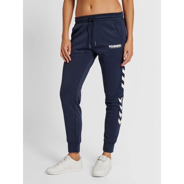 Damskie spodnie dresowe Hummel Legacy. Niebieskie spodnie sportowe damskie HUMMEL, s, z dresówki, do biegania. Za 171.50 zł.
