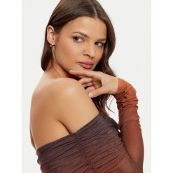 Kolczyki Guess. Żółte kolczyki damskie Guess, złote. Za 179.99 zł.