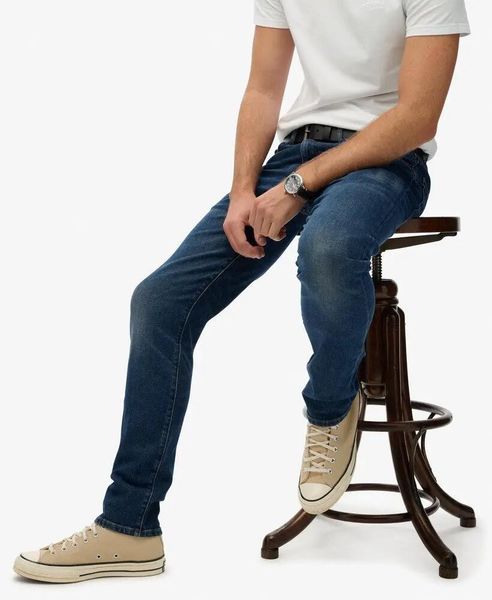 Superdry Jeansy Vintage Slim Straight z bawełny organicznej. Niebieskie jeansy męskie Superdry. Za 438.50 zł.