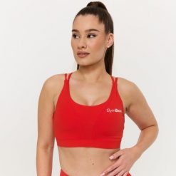 Biustonosz sportowy damski fitness bez zapięcia mandarynkowy BEAT. Brązowe biustonosze sportowe damskie GYMBEAM, bez wzorów, z elastanu. Za 85.90 zł.