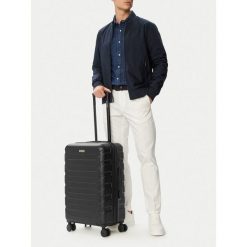 Walizka średnia GINO ROSSI. Czarne walizki Gino Rossi, bez wzorów, średnie. Za 279.99 zł.