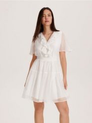 Sukienka z lyocellem - biały. Białe sukienki damskie Reserved, l, bez wzorów, z lyocellu, bez kołnierzyka, bez ramiączek, mini. W wyprzedaży za 59.99 zł.