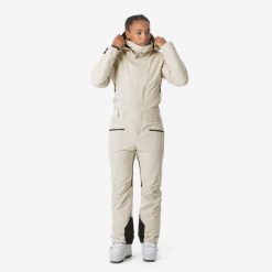 Kombinezon narciarski i snowboardowy damski Quechua Suit 500. Białe kombinezony damskie WED'ZE, na zimę, l, bez wzorów, z materiału, bez kołnierzyka, bez ramiączek, długie. Za 649.99 zł.