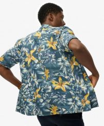 Superdry Koszula Hawaiian Printed z bawełną i modalem. Niebieskie koszule damskie Superdry., na lato, m, bez wzorów, z bawełny, klasyczne, bez kołnierzyka, bez ramiączek. Za 287.75 zł.