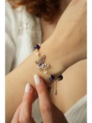 Pierres delicates Pozłacana bransoletka z ametystami i cyrkoniami rozmiar: onesize. Różowe bransoletki damskie Pierres delicates, pozłacane. Za 69.58 zł.