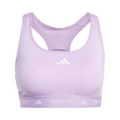 Biustonosz dla kobiet adidas Tech Fit. Fioletowe biustonosze Adidas, bez wzorów. Za 171.50 zł.