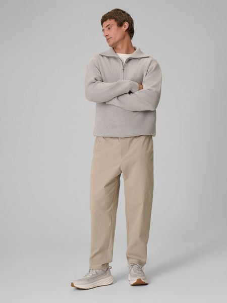 4F Spodnie casual męskie - beżowe L. Brązowe spodnie dresowe męskie 4f, bez wzorów, z dresówki. Za 189.99 zł.
