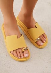 Żółte Klapki Japonki Ozdobione Aplikacją na Palcu Noevianna. Żółte klapki damskie Renee, z aplikacjami, z jeansu, bez obcasa, na płaskiej podeszwie. Za 79.99 zł.