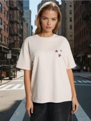 Bluza z krótkim rękawem i napisem na plecach - kremowy. Białe bluzy bez kaptura damskie Sinsay, l. Za 35.99 zł.