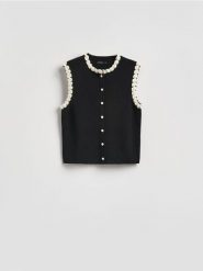 Kamizelka z ozdobnym wykończeniem - czarny. Czarne kamizelki damskie Reserved, l, z dzianiny. Za 119.99 zł.