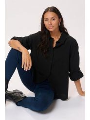 Kaffe Koszula w kolorze czarnym rozmiar: 34. Czarne koszule damskie Kaffe, bez wzorów, z bawełny, bez kołnierzyka, bez ramiączek. Za 104.99 zł.