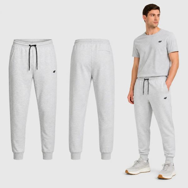 SPODNIE MĘSKIE DRESOWE 4F SPORTOWE DRESY JOGGERY M M1676 SS26. Czarne spodnie sportowe męskie 4f, z bawełny. Za 159.99 zł.