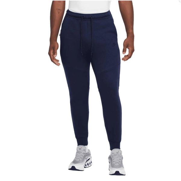 Spodnie sportowe męskie Tech Fleece Pant. Niebieskie spodnie sportowe męskie Nike, z bawełny. Za 417.25 zł.