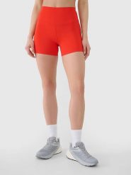 4F Szorty sportowe w kolorze czerwonym rozmiar: M. Czerwone spodenki sportowe damskie 4f, m, z materiału, outdoorowe. Za 61.46 zł.