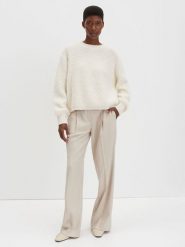 Someday Sweter "Telena" w kolorze kremowym rozmiar: 38. Brązowe swetry klasyczne damskie Someday, bez kołnierzyka. Za 255.94 zł.