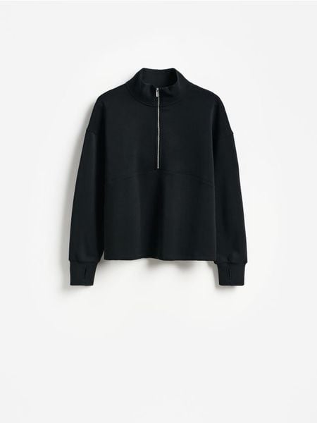 Bluza z dodatkiem modalu - czarny. Czarne bluzy bez kaptura damskie Reserved, l, z dzianiny. Za 129.99 zł.