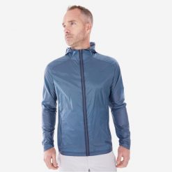 Softshell turystyczny męski Quechua MH900. Niebieskie kurtki softshell damskie QUECHUA, l, bez wzorów, z materiału, bez kaptura. Za 89.99 zł.