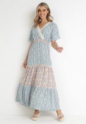 Niebiesko-Miętowa Rozkloszowana Sukienka Maxi z Gumką w Talii i Koronkowym Dekoltem Gerbera. Niebieskie sukienki damskie Born2be, na imprezę, na lato, l, bez wzorów, z koronki, bez kołnierzyka, bez ramiączek, maxi, kopertowe. W wyprzedaży za 95.99 zł.