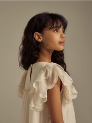 Tiulowa sukienka - kremowy. Białe sukienki dziewczęce Reserved, bez wzorów, z tiulu, bez ramiączek. Za 109.99 zł.