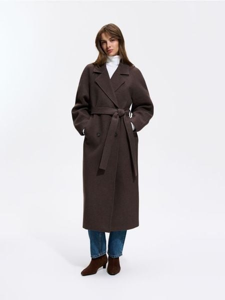 Dwurzędowy płaszcz oversize - ciemnobrązowy. Brązowe płaszcze damskie Reserved, l, bez wzorów, z tkaniny. Za 299.99 zł.