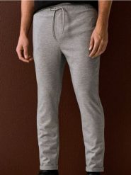 Spodnie dresowe jogger z domieszką wiskozy - szary. Szare spodnie sportowe męskie Sinsay, z dresówki. Za 49.99 zł.