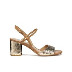 Damskie sandały na obcasie Geox Virnilisa 65. Brązowe sandały damskie Converse, bez wzorów, z materiału, bez obcasa, na obcasie. Za 331.50 zł.