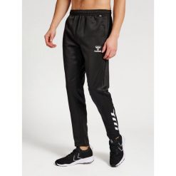 Spodnie do biegania Hummel Core XK Poly. Czarne spodnie sportowe damskie HUMMEL, do biegania. Za 203.50 zł.