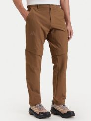 Adidas Spodnie outdoor KW7459 Brązowy Regular Fit. Brązowe spodnie sportowe męskie Adidas, z syntetyku. Za 349.99 zł.