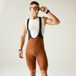 Męskie spodenki kolarskie Ultra Bibbed. Brązowe szorty męskie Dare 2b, z elastanu, bez kołnierzyka. Za 449.99 zł.