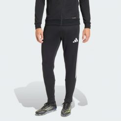Spodnie treningowe Tiro 26 League. Białe spodnie materiałowe męskie Adidas, bez wzorów, sportowe. Za 219.00 zł.