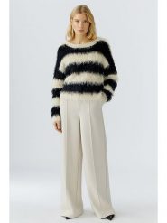 Oui Spodnie w kolorze kremowym rozmiar: 42. Brązowe spodnie materiałowe damskie Oui, bez wzorów, z materiału. Za 300.92 zł.