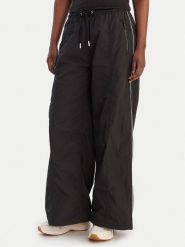 Tommy Jeans Spodnie materiałowe DW0DW22289 Czarny Regular Fit. Czarne jeansy damskie Tommy Jeans, bez wzorów, z jeansu. Za 449.99 zł.