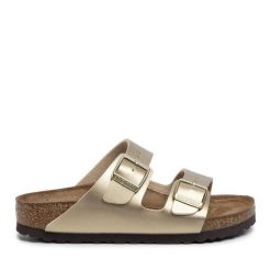 Klapki Birkenstock. Żółte klapki damskie Birkenstock, bez wzorów, bez obcasa. Za 379.99 zł.