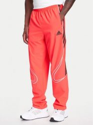 Adidas Spodnie dresowe Teamgeist adicolor JW5871 Czerwony Loose Fit. Czerwone spodnie dresowe męskie Adidas, bez wzorów, z dresówki. Za 219.99 zł.